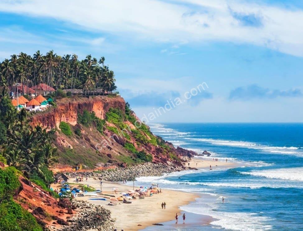 praia-bonita-goa-primavera Praia deslumbrante em Goa durante a primavera, com areia dourada, mar azul e céu claro