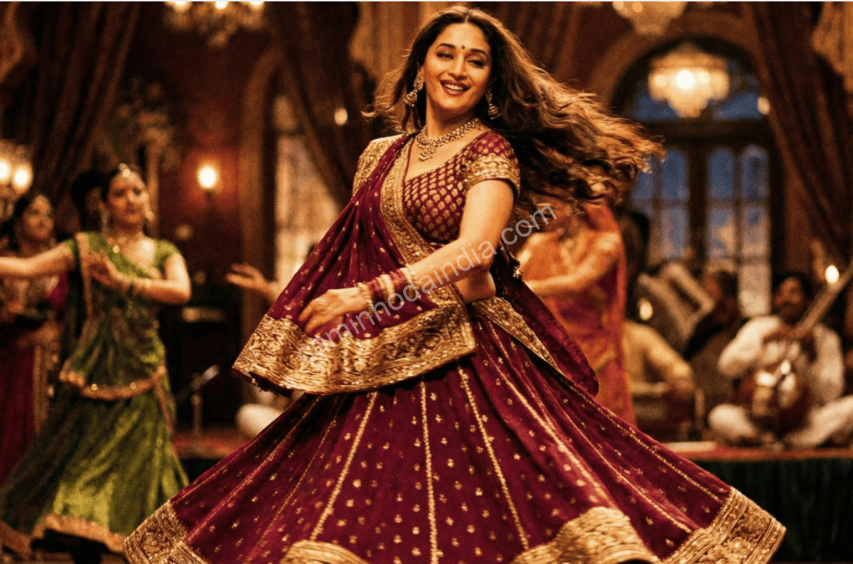 madhuri-dixit-atriz-bollywood-danca-elegancia Madhuri Dixit em cena de Bollywood, conhecida por sua dança graciosa e atuação marcante